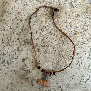 Vintage stone and leather whale tail necklace